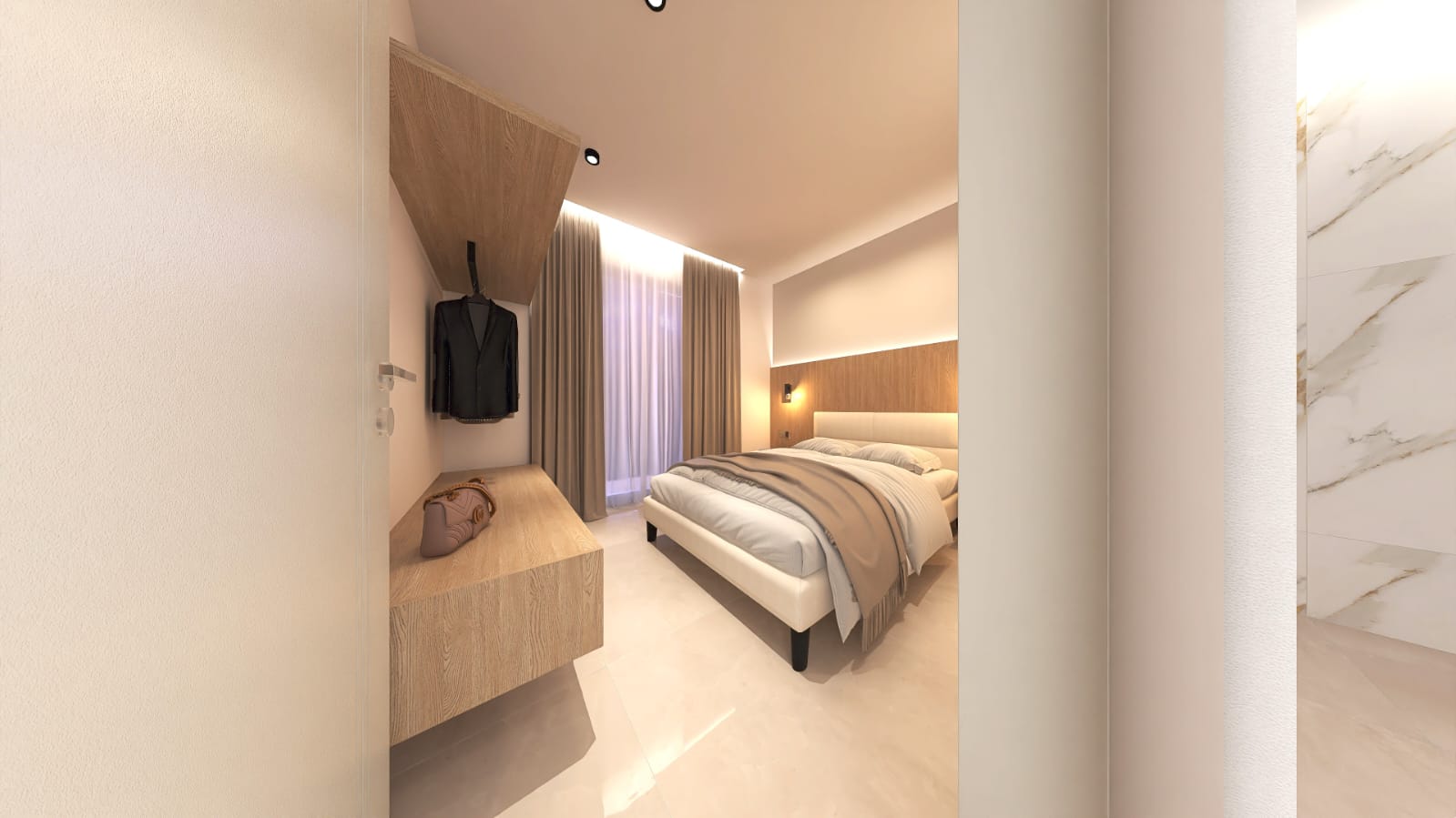 Bedroom with view towards marble bathroom